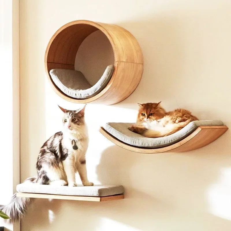 Estantes de madera para escalar gatos montados en la pared
