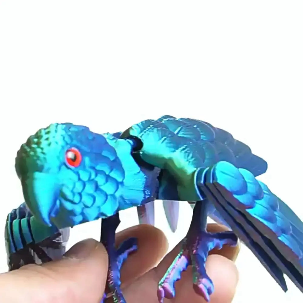 Figura de loro articulada: ave impresa en 3D con alas móviles