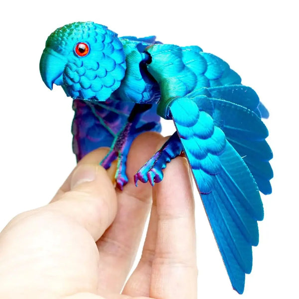 Figura de loro articulada: ave impresa en 3D con alas móviles