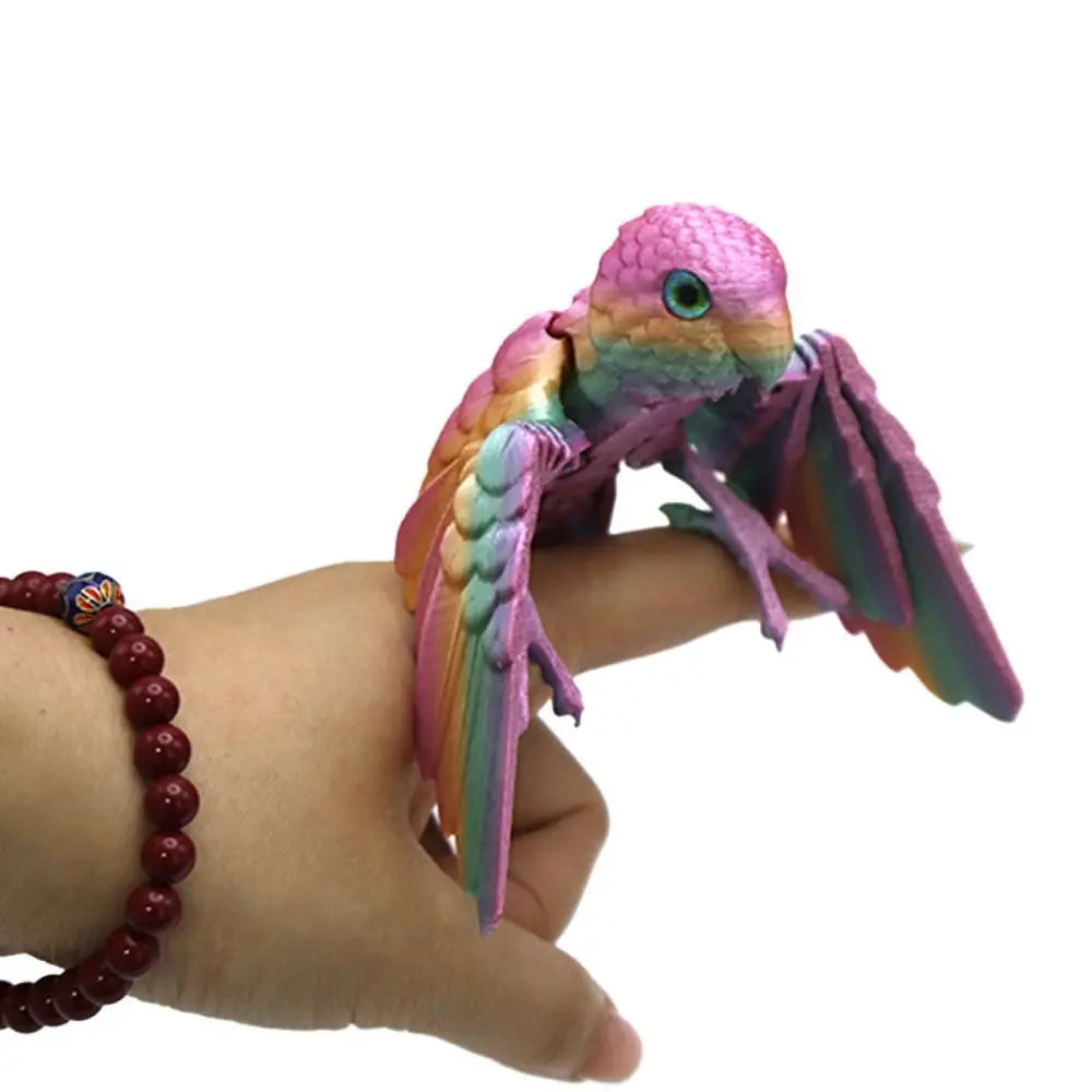 Figura de loro articulada: ave impresa en 3D con alas móviles