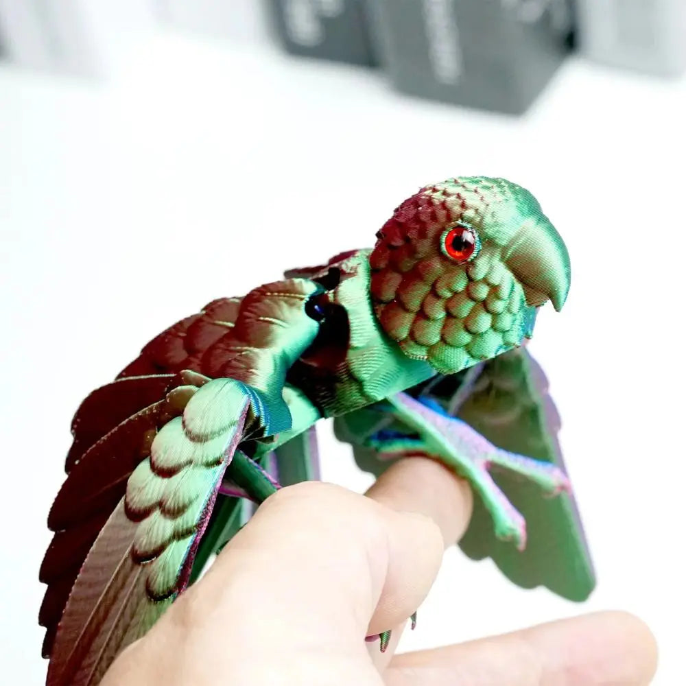 Figura de loro articulada: ave impresa en 3D con alas móviles